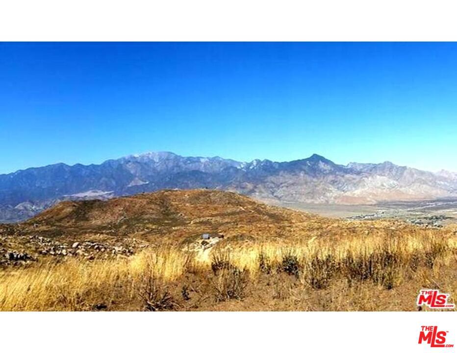 HORSES, COWS, PIGS, ORGANIC GARDENS and KIDS.. 21.13 ACRES IN WONDERFUL TWIN PINES... IF YOU ARE LOOKING FOR THE PERFECT PROPERTY LOCATION TO LIVE TOTALLY OFF THE GRID THEN THIS IS THE DREAM PROPERTY FOR YOU. BREATHTAKING PANORAMIC MOUNTAIN AND BLUE SKY VIEWS with SLIGHT EASTERN VIEWS OF THE PALM SPRINGS WINDMILLS. THIS PROPERTY IS A GREAT PLACE FOR MASTER GARDENING and to BUILD THE RANCHito OF YOUR DREAMS. IDEAL ELEVATION OF 3500 FEET (approx) ABOVE SEA LEVEL H2o (talking about waster, the WATER METER has been installed ON the PROPERTY).. OWNER WILL CONSIDER CARRYING PAPER, 5-YEARS WITH GOOD DOWN.