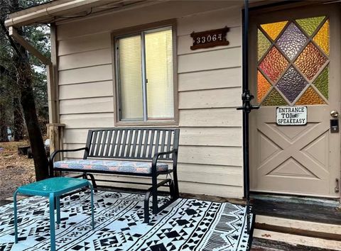 Photo of 33064 Arrowbear Dr, Running Springs, CA 92382 (MLS # OC26065934)