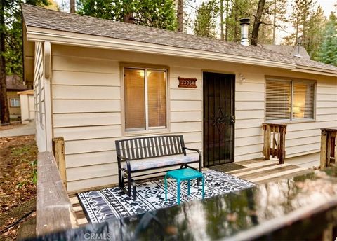 Photo of 33064 Arrowbear Dr, Running Springs, CA 92382 (MLS # OC26065934)