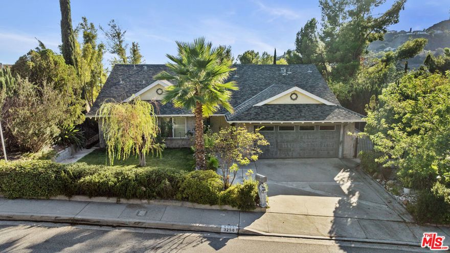 Welcome to 3258 Kirkham Drive, an elegantly preserved Glendale residence tucked into the peaceful foothills, surrounded by breathtaking mountain views and timeless California charm. This beautifully maintained home blends classic character with modern comfort, offering light-filled living spaces, refinished finishes, and a seamless indoor-outdoor flow that makes every day feel like a retreat. Step inside to find an inviting living room with expansive windows framing the hills, a thoughtfully updated kitchen ready for your culinary touch, and spacious bedrooms designed for relaxation. The private backyard offers a tranquil setting for gatherings, gardening, or simply enjoying the sunset against the San Gabriel Mountains. Located in one of Glendale's most sought-after neighborhoods, this property offers peaceful hillside living just minutes from downtown Glendale, Montrose Village, and award-winning schools. Whether you're searching for your first home, a forever residence, or an elegant retreat, Kirkham Drive welcomes you with open arms. A rare opportunity to own a piece of Glendale's serenity beautifully cared for and ready for its next chapter.