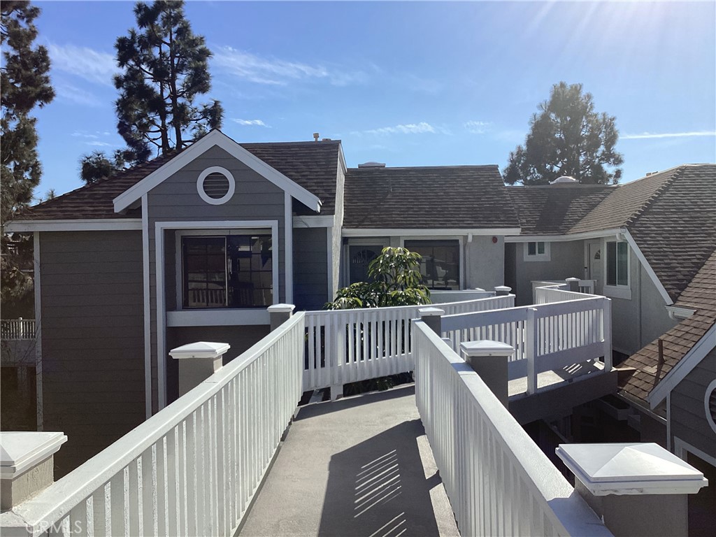 Walk to the beach! two bed 2 bath with carport. Vaulted ceilings, outside elevator, pool, tennis court, basket ball, pickleball and a sport court. Top floor with no one over you with a clear view over the tennis court and of palm trees on the ocean. UNFURNISHED. Sorry no pets. "pointe surfside" is waiting for you.