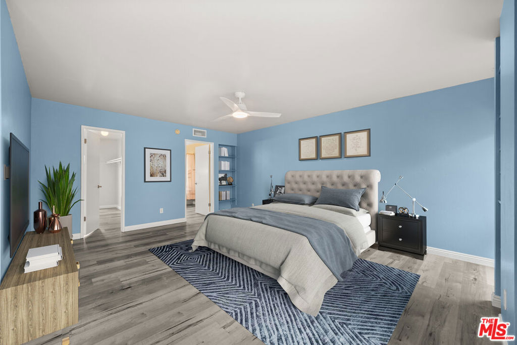This spacious 2-bedroom, 3-bath townhouse in the heart of Sherman Oaks offers nearly 1,600 square feet of bright and comfortable living, thoughtfully updated with modern essentials and ready for your personal touch. The open-concept main level features a large living room with a cozy fireplace flowing seamlessly into a formal dining area and updated kitchen, ideal for both everyday life and entertaining guests. The living room opens to a private rebuilt deck, perfect for morning coffee or evening relaxation. Upstairs, you'll find two generously sized en-suite bedrooms, including a primary retreat with a large walk-in closet and full bath. On the bottom floor, you have an oversized 2 car garage with PLENTY of storage space, a large laundry area, and direct access to the unit. Enjoy peace of mind with key upgrades already in place: dual-pane windows, updated copper plumbing, a new electrical panel, NEST thermostat with newer HVAC, and a recently replaced roof. This community is beautifully maintained and features a pool, spa, clubhouse, and lush grassy areas all with low HOA dues and earthquake insurance included. Just minutes from Ventura Blvd, major freeways, shops, restaurants, and houses of worship, this inviting townhouse offers the convenience you want with the flexibility to customize over time. A smart investment and a warm place to call home don't miss it!