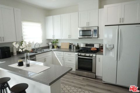 Photo of 1157 S Point View Street, Los Angeles, CA 90035 (MLS # 26722187)