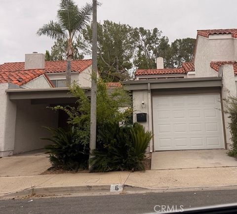 Photo of 6 Coral Tree Lane, Irvine, CA 92612 (MLS # OC26096992)