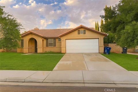 Photo of 1609 Sutherland Street, Lancaster, CA 93534 (MLS # IG25217298)