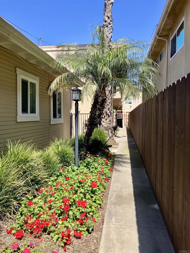 Fantastic 2 bed / 1 bath unit with a single car garage on the 1st floor of a small fully gated triplex in THE BEST POSSIBLE LOCATION of Northpark. 2 minute walking distance to University Ave Coin-op, The Office, Whiskey Grand, Saigon Coffee, Target, Yoga Box, Mike Hess Brewing etc and only 2 minute drive from 805 highway access to avoid traffic. The unit is located in a small fully gated triplex with a house in the front and includes a private 1 car garage at the rear. The property has a private walkway lined with palm trees and attractive landscaping. The unit has vinyl flooring, updated white tile shower, a dishwasher, and ceiling fans in the bedrooms. There is a large on-site laundry room directly next to the unit that is shared by only 3 units. Rent is $2,495 + $75 flat fee for Water/Sewer/Trash. Tenant pays for electricity directly. The unit will be available for move-in 09/15/25 with a 1 year lease