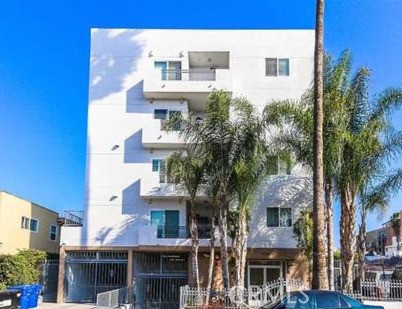Well-designed 3-bed + 2-bath condominium on a quiet street in the heart of Koreatown. This home offers a functional layout with a spacious open-concept living and dining area connected to the kitchen, featuring laminate hardwood flooring. The gourmet kitchen includes a center island, granite countertops, and stainless steel appliances. Bedrooms are generously sized, bright, and include plenty of closet space with carpet flooring. The master suite also features a small balcony with rooftop views. Both bathrooms are nicely sized with tile flooring. Additional highlights include a separate laundry room and two-car tandem gated parking. Conveniently located near major metro stops and just minutes from downtown L.A., restaurants, shopping, and entertainment. A great opportunity to live in one of the most desirable neighborhoods!