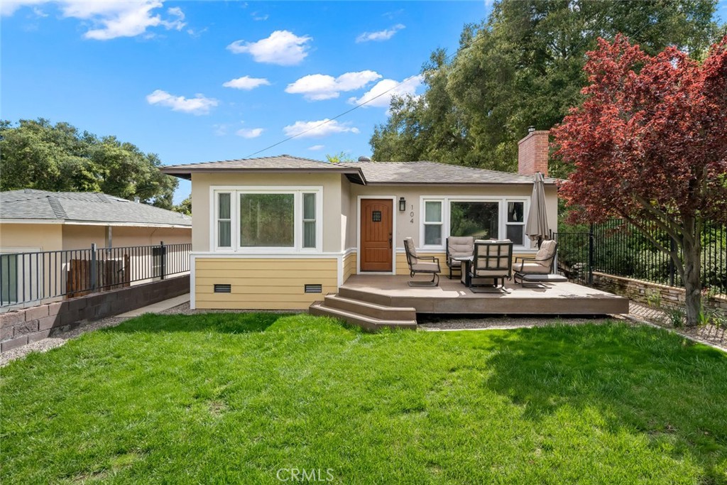 This beautifully refreshed 3-bedroom, 2-bathroom home offers a seamless blend of style, comfort, and flexibility. Inside, LVP flooring grounds the space, while a cozy fireplace in the living room sets the tone for relaxed evenings at home. The modern kitchen is outfitted with stainless steel appliances—including a Wolf range—bringing both beauty and functionality to the heart of the home. The primary suite features a walk-in closet and a private ensuite bath, creating a peaceful retreat tucked away from the rest of the home. Out back, a private deck and paved patio invite easy indoor-outdoor living, surrounded by lush landscaping and quiet charm. A detached studio and separate office space provide endless versatility—perfect for remote work, guests, or rental income potential. Perfectly positioned in downtown Paso Robles, this property places you just moments from the city’s vibrant restaurant scene, boutique shopping, and world-renowned wineries. Whether you're looking for a full-time residence, investment property, or weekend retreat, this home delivers the best of Paso Robles living.