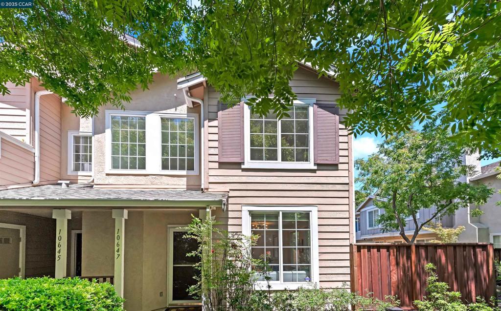 Truly the best location in the desirable California Highlands community! This end-unit townhome is nestled on a quiet lane at the edge of the community with no through traffic. It boasts serene wooded views and provides a unique and tranquil environment. Just steps away from the entrance to Dublin Hills Regional Park, this turn-key end-unit townhome with open floorplan, double high ceilings at entrance, new custom two-tone paint, modern light fixtures and nature views is a must see. Beautiful neutral color palette with white and grey walls, timeless hardwood floors and large picture windows looking out to gorgeous views of nature. The eat-in kitchen boasts a gas stove, stainless steel refrigerator, white countertops and neutral wood cabinets with breakfast bar. The primary suite offers an attached updated bathroom with walk-in closet. Lots of storage space throughout with attached two-car garage and low maintenance minimalist patio yard. Low HOA dues covers swimming pool, exterior maintenance and roof. Conveniently located near the 580/680, BART, shopping, dining and top-rated schools. Stop by our open house to get the full experience as it's even better in person!