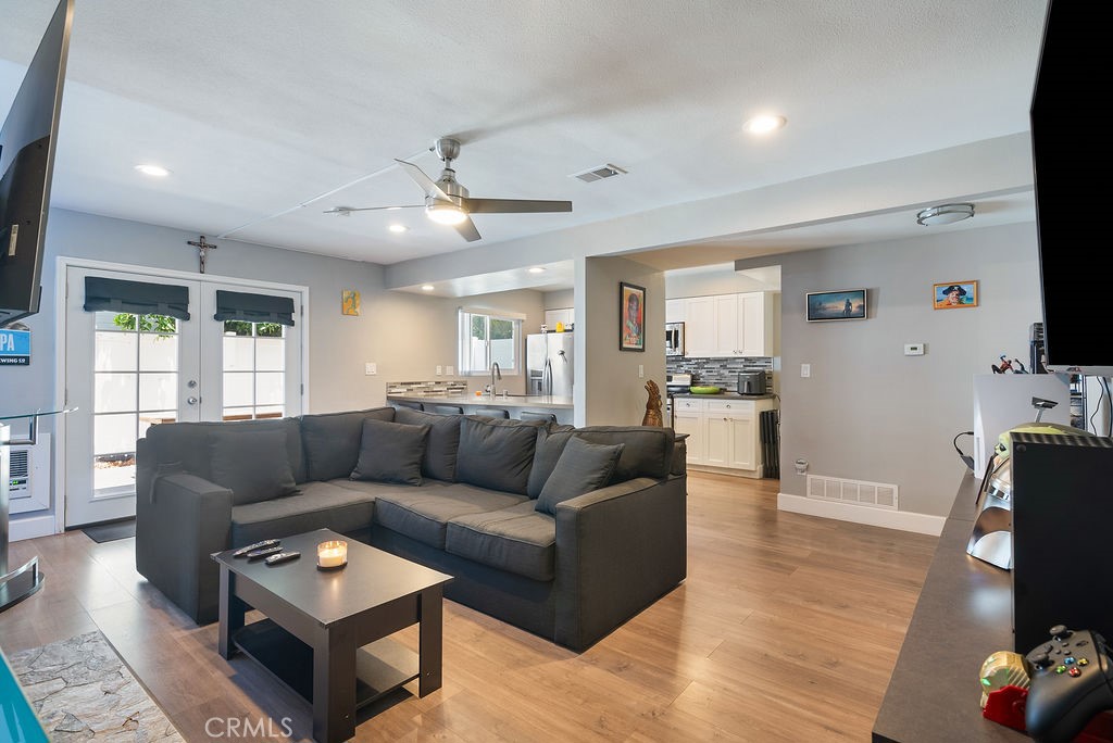 Price reduced! This nicely upgraded 2-bedroom, 2-bathroom condo welcomes you home. Perfectly positioned near premier shopping, delectable dining, and the bustling Tustin Market Place, with seamless access to the 5 and 55 freeways, convenience is at your doorstep.
Step inside to a turnkey unit, with laminate wood flooring throughout, complemented by an upgraded open kitchen boasting sleek cabinets, shimmering quartz countertops, and stainless appliances. The fully updated bathrooms feature chic vanities, while custom LED lighting casts a warm glow across every room. Upgraded doors, windows, and a wall AC unit ensure year-round comfort, blending style with functionality.
Cozy up by the fireplace, enjoy the convenience of in-unit washer and dryer hookups, and step outside to your private backyard—perfect for savoring Southern California’s idyllic weather. Beyond your door, indulge in resort-style amenities, including a sparkling community pool, inviting clubhouse, and playful playground. Perfect 2 bedroom starter home in the Heart of OC!