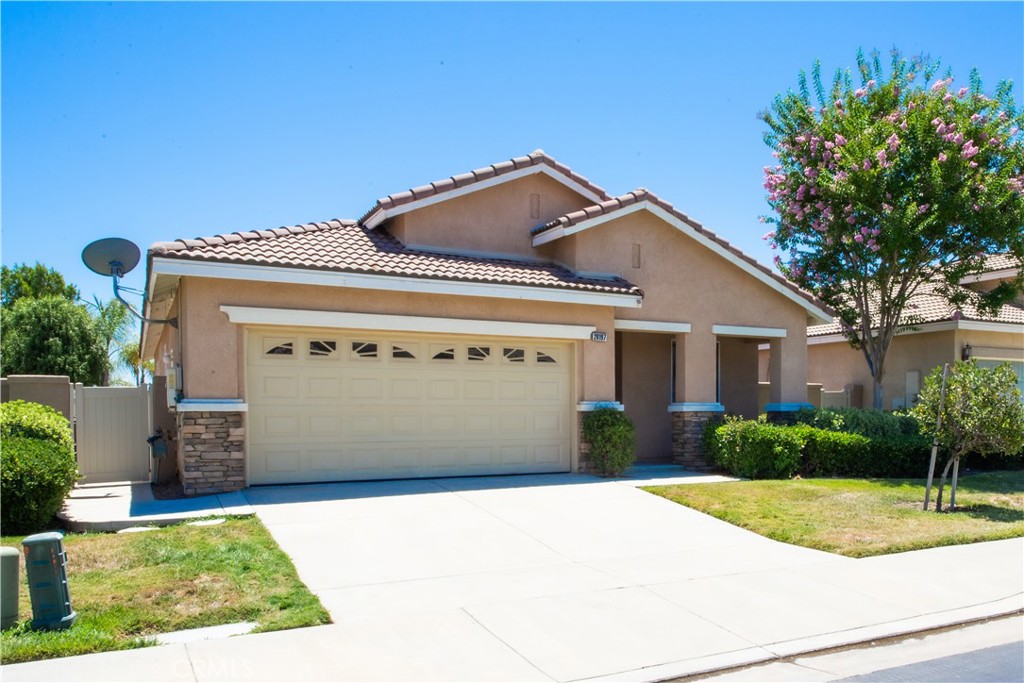 Highly upgraded and customized home with OWNED SOLAR at a premier "Over 55" gate guarded golf resort. Wood type tile and vinyl floors, plantation shutters and custom paint throughout. Great curb appeal with flagstone type accents and covered front porch. Enter into a flex room with leaded glass windows usable as a parlor, formal dining room, music room or office. Big kitchen featuring granite counters, gorgeous tile backsplashes, expanded island with breakfast bar, cabinets galore, large pantry, desk and dining area. The living/great room has a beautiful tile fireplace, ceiling fan, slider to the covered patio and entertainment niche. Big office/den convertible to a 3rd bedroom. Grand master suite bedroom with leaded glass window and ceiling fan. The master bath has a dual sink vanity, separate tub and shower, walk-in closet with mirrored doors, linen cabinet and a private commode. Generous sized guest bedroom with ceiling fan, mirrored closet doors and adjacent full bath. Laundry room washer and dryer are included. Covered patio, low maintenance gardens, wide side yard and vinyl fencing all around. 2-car finished garage with lots of overhead storage racks. HOA dues include front yard maintenance and trash pick-up. No Mello-Roos. Extraordinary community amenities include a 22,000 sq. ft. clubhouse with immense auditorium with indoor and outdoor stages, dance floors and commercial kitchen. Media/card room, multi-purpose rooms, state-of-the art fitness center, library, computer center and billiard parlor. Tropical pool and spa. BBQ area set against a lovely mountain backdrop. Two night lighted tennis courts and four pickleball courts. Social and recreational clubs galore. This community is ideally located about an hour's drive to Orange and L.A. Counties, downtown San Diego, Idyllwild and Palm Springs. Close to Temecula, the Wine Country and Casinos.