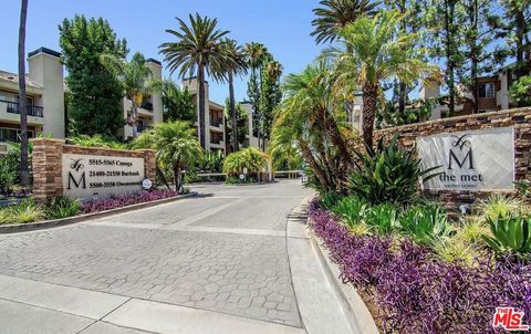 Photo of 5545 Canoga Ave #203, Woodland Hills, CA 91367 (MLS # 25618997)