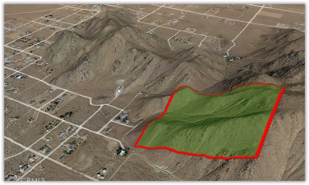 Stunning view of this amazing 40-acre lot in top of the mountain, surrounded by beautiful desert mountains with a wonderful view of beautiful sunrises and unforgettable sunsets.
