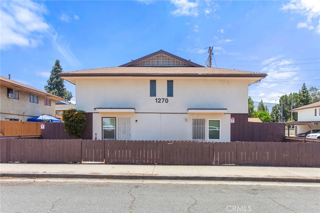 1270 W 9th St is a rare investment opportunity featuring strong current rents with room for upside—especially with one unit delivered vacant at close can go straight to Market Rent! This remodeled 4-unit apartment building is ideally located just minutes from the 91 Freeway in the high-demand city of Corona, CA, on the edge of Orange County. It is located within 2-2.5 miles of BOTH North Main and West Corona Metrolink stations. EACH unit has 2 bedrooms, 1.5 bath, and 1 carport. Owner has updated all units with new flooring, Kitchens, bathrooms, windows, front metal door, Ac's and much more! Updates have been made in all 4 units. Surrounded by key amenities including shopping, dining, parks, hiking trails, Lake Mathews, and even nearby beaches, this property is well-positioned to attract higher-income tenants seeking affordable housing near major employment hubs. With a 76 Walk Score and only 5 minutes from the Metrolink, it’s a commuter-friendly location that appeals to tenants working throughout the Inland Empire and Orange County. Landlord to pay for water and trash. Click supplementals to see the memorandum