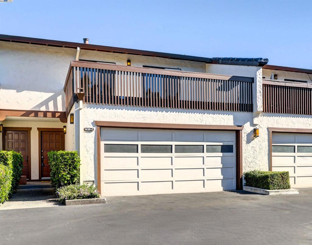 Welcome to 1430 Gordon Street Unit C, a spacious 3 bedroom, 2 and 1/2 bath townhome featuring 1,585 square feet of comfortable living space and endless potential in one of Redwood City’s most desirable locations. Freshly updated with new carpet and interior paint, the home is well maintained but also presents an incredible opportunity to customize and create your dream space. The thoughtful layout includes open living and dining areas that create an inviting flow for daily life and entertaining with slider access to a private patio. The primary suite includes abundant closet space and opens to its own covered balcony, while the second and third bedrooms share access to a large private balcony. An attached two car garage provides convenience and storage, while the community adds even more value with a sparkling pool and exterior maintenance included through the HOA. Unbeatable Peninsula location puts you just minutes from vibrant downtown Redwood City dining and shopping, with easy Caltrain access for effortless Bay Area commuting. You'll enjoy nearby parks and recreational opportunities while staying connected to major highways and Silicon Valley employers, making this the perfect base for Peninsula living. Experience the perfect blend of a central Peninsula lifestyle with the