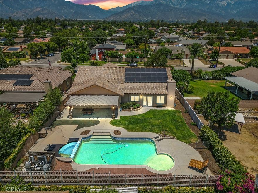 This beautiful single-story home offers 4 bedrooms, 3 bathrooms, and 2,631 square feet of comfortable living space. Built in 2014, it features an open floor plan filled with natural light, creating a bright and welcoming atmosphere throughout the living, dining, and family areas.

At the heart of the home, the spacious kitchen is designed for connection and convenience. A large center island, extended counter space, gas range, and abundant cabinetry make it both functional and inviting. The kitchen flows seamlessly into the family room and opens directly to the backyard—ideal for everyday living and entertaining.

The primary suite provides a private retreat, complete with a walk-in closet and a spa-like bathroom featuring dual sinks, a soaking tub, and a step-in shower. The additional bedrooms are generously sized, and the oversized laundry room offers extra storage and functionality.

Step outside and enjoy a backyard designed for relaxation and fun. A sparkling pool with spa, built-in BBQ, and landscaped grounds make it a perfect place to unwind or host gatherings.

Additional highlights include seller owned solar, energy-efficient windows, insulated interior walls, and a finished 3-car garage. On an approximately 11,000 square foot lot, this home offers the perfect balance of space, style, and comfort—inside and out.