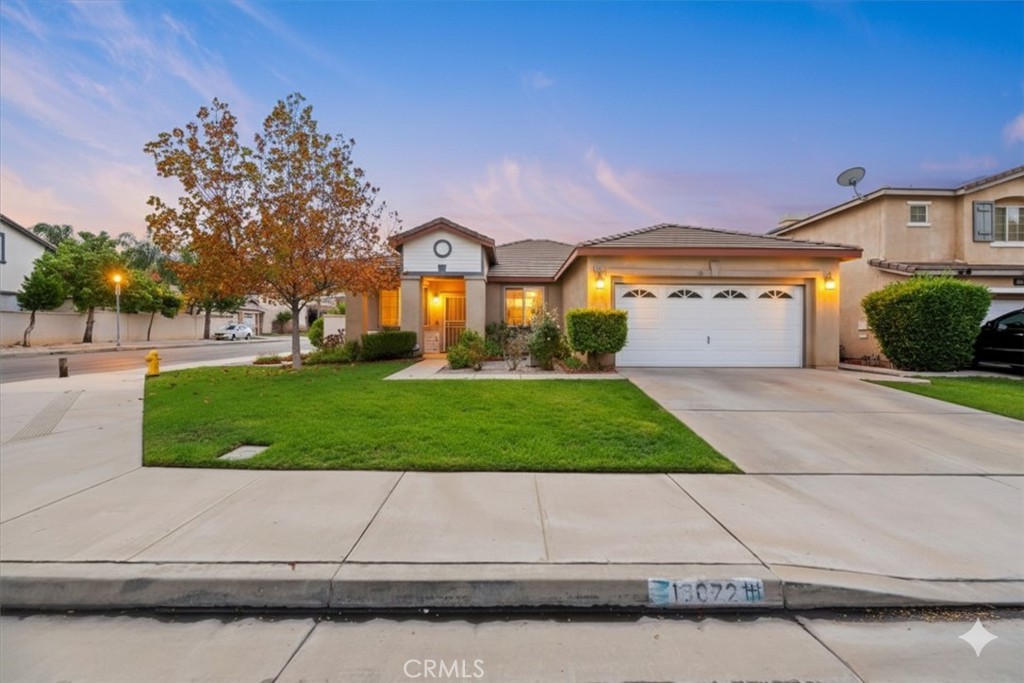Welcome to 16072 Palomino Lane in Moreno Valley Ranch!
This beautifully maintained single-story home offers 4 bedrooms, 2 bathrooms, and 1,860 square feet of comfortable living space on a desirable corner lot. The open floor plan features a spacious family room with a cozy fireplace, perfect for relaxing or entertaining. The kitchen opens to the dining area, creating a seamless flow throughout the main living spaces.
Enjoy plenty of parking for family and guests, along with a large two-car garage and a durable tile roof. Step outside to a covered patio overlooking a generous, pool-sized backyard with mature landscaping that provides a serene, park-like setting—ideal for gatherings or quiet evenings outdoors.
Located in the sought-after Moreno Valley Ranch, a 3,800-home master-planned community, residents enjoy exceptional amenities including a 35-acre lake with fishing and boating, a large community pool and spa, a fitness center, private and public parks, and a residents-only recreation center.
Conveniently situated near local schools, shopping, and freeway access, this home offers both comfort and community in one of Moreno Valley’s most desirable neighborhoods.