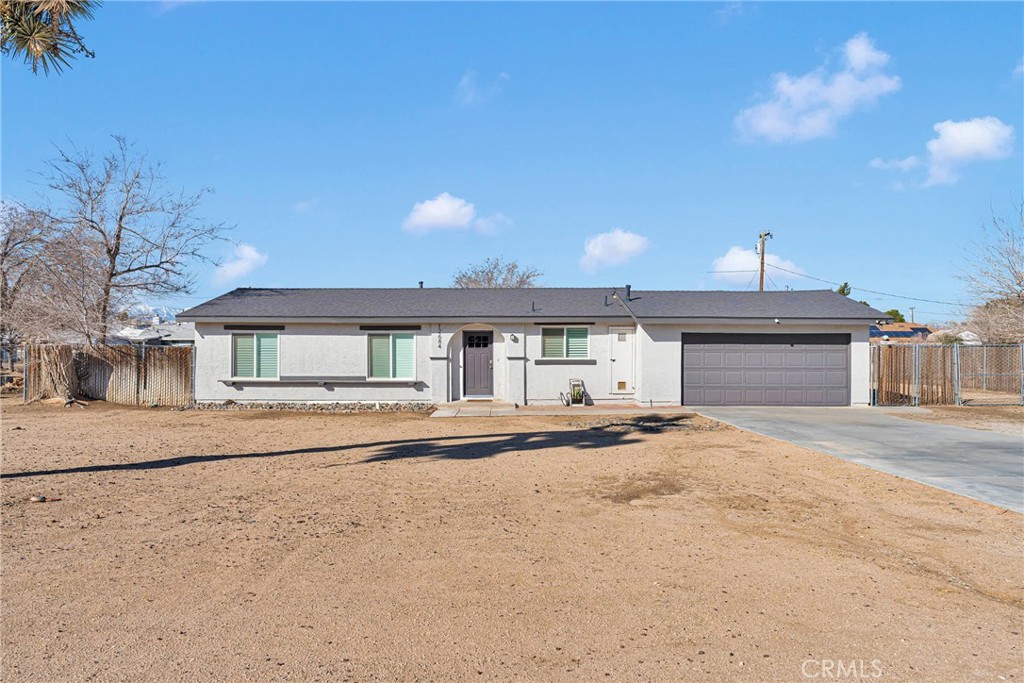 This home is move in ready and shows pride of ownership. This beautifully renovated 3 bed, 2 bath Apple Valley home features a brand-new roof with a 50-year transferable warranty, modern finishes throughout, and energy-efficient upgrades. Enjoy a fully remodeled kitchen with stainless steel appliances. The paid-off solar system and Tesla backup battery offer huge utility savings and peace of mind. Additional upgrades include a new electrical panel, custom shutters, and updated flooring. Relax outdoors under the covered patio in a large, private backyard on a 0.41-acre lot. Located in a quiet neighborhood near schools and amenities. Don’t miss this turnkey home with all the updates and paid off solar!
