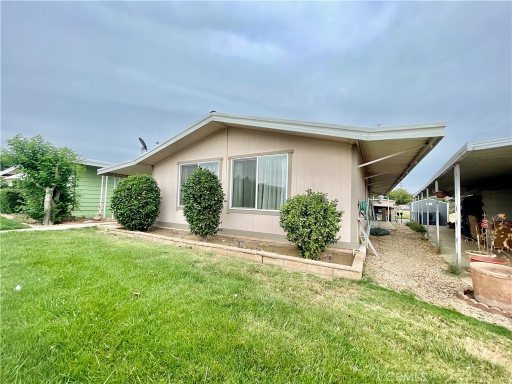 Welcome to 33600 Calimesa Blvd #37, a spacious 2 bedroom, 2 bathroom home in the highly desired 55+ Hillcrest Mobile Estates community in Yucaipa. This property offers nearly 1,400 sq. ft. of living space, not including the large enclosed sunroom that adds extra flexibility for hobbies, entertaining, or relaxing.
Inside, the open floor plan features vaulted ceilings, a round-style kitchen, a Jack-and-Jill bathroom, and a convenient mudroom-style laundry area with outdoor access. The primary suite includes mirrored closet doors, double sinks, and a soaking tub. The secondary bedroom and bathroom provide comfortable space for guests or office use.
This home is situated in one of the best spots within Hillcrest. The front of the property overlooks a green lawn and breezeway sidewalk, creating the feel of a front yard with a small patio sitting area. The street also backs to the parking area, which includes two private storage sheds for added convenience.
Hillcrest Mobile Estates is a well-maintained, senior 55+ community located on Calimesa Boulevard. Residents enjoy access to a beautiful clubhouse, swimming pool, and social activities. The affordable space rent is under rent control, providing peace of mind for long-term affordability.
If you’re looking for a spacious home in a friendly senior community with easy access to I-10 Freeway Yucaipa shopping, dining, and medical services, this property is a must-see.