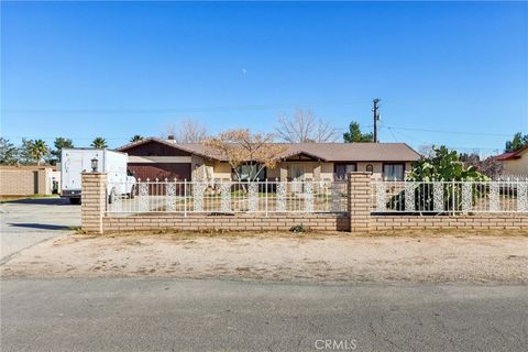 Photo of 14057 Crow Rd, Apple Valley, CA 92307 (MLS # RS25281523)