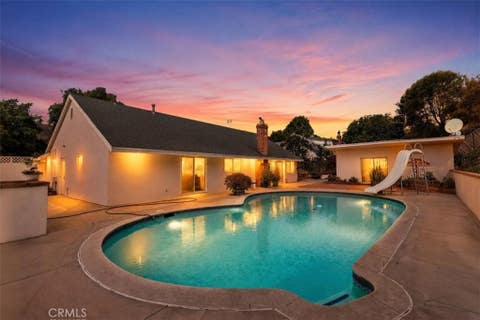 Photo of 5553 Peacock Lane, Riverside, CA 92505 (MLS # IV26132985)