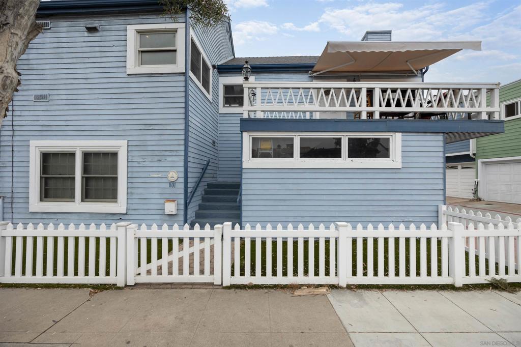 South Mission beauty with ocean breezes, partial view of the Jetty/Bay at the end of Mission Blvd near the park. This 3 Bedroom 2 bath is all one level with a roof top deck. The travertine floors are throughout and the wooden like plantation shutters give the warmth of the Bahamas. The high ceilings and sky light in the dining room adds natural light to the living room and kitchen. The kitchen has stainless steel appliances, granite counter tops with a breakfast bar suitable for large gatherings and family fun. The hall bath was custom designed with a tiled surround tub and granite vanity. The primary bedroom has high ceilings with a walk in spacious closet. The bath has dual vanity sinks, tub and separate shower. The deck at the front is generous and a great place to people watch.