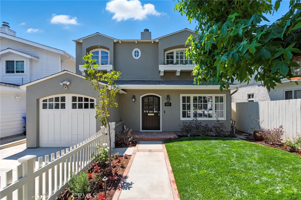Welcome to this picture-perfect Coastal Traditional home, ideally located in the highly sought-after Tree Section of Manhattan Beach. From the moment you arrive, you're charmed by the storybook curb appeal—complete with a white picket fence—setting the tone for this beautifully remodeled 4-bedroom, 3-bathroom residence.
Inside, natural light fills the formal living room with a cozy fireplace and elegant dining area, all complemented by stunning walnut hardwood floors throughout. The beautifully updated kitchen features Thermador appliances, freshly painted cabinetry, generous storage, and opens to the spacious family room, creating the perfect setting for both everyday living and entertaining.
French doors lead to the sun-drenched, west-facing backyard, a true highlight—ideal for indoor-outdoor living with a trellis-covered patio, large built-in firepit, also on the main level: a remodeled full bathroom and a versatile fourth bedroom, perfect for guests or a home office.
Upstairs, you’ll find three additional bedrooms, including the expansive primary suite, complete with a beautiful fireplace—a true retreat with a spa-inspired bathroom featuring a soaking tub, frameless glass shower, and oversized dual-sink vanity with premium finishes. A sunny built-in workspace with storage and a cozy window seat adds functionality and charm to the upper level, along with a beautifully remodeled hall bath.
Additional features include:
• Interior repaint
• Whole house water filtration system
• New roof (2022)
• Air conditioning
• Upgraded electrical panel
• Remodeled kitchen with Thermador appliances and built-in new Thermador refrigerator 2025
• Fully updated bathrooms
• Fresh landscaping front and back
Enjoy the best of Manhattan Beach living—tree-lined streets, top-rated schools, walk to Pacific Elementary, and walkability to downtown, the beach, parks, and beloved local restaurants.
Don't miss the opportunity to own a stunning, move-in-ready home in one of the most desirable neighborhoods in Manhattan Beach. Don't miss this special home!