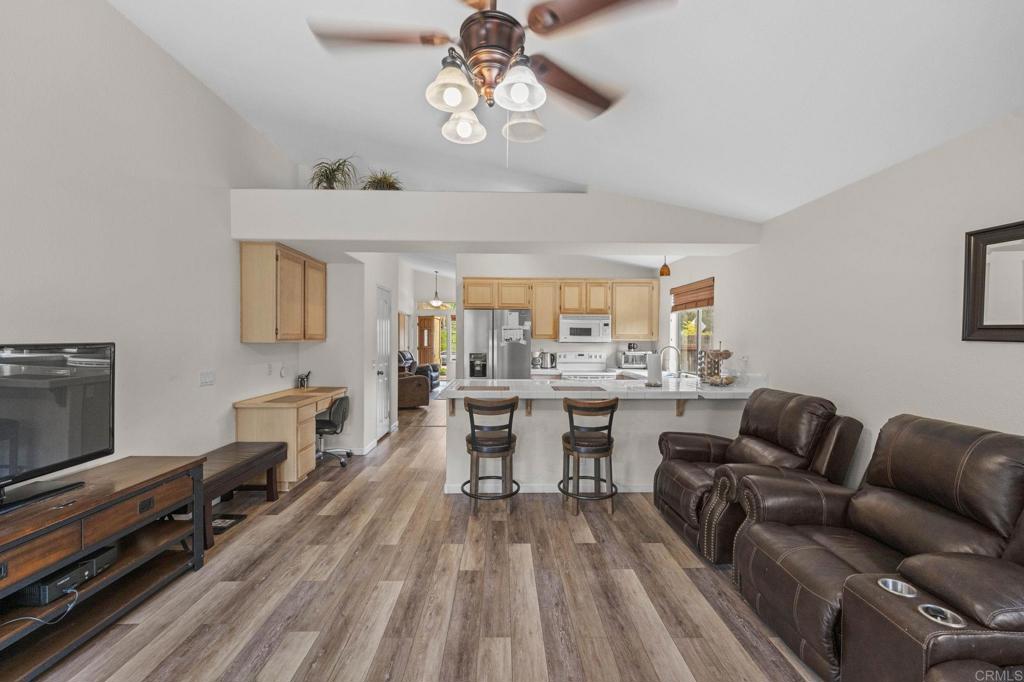 Welcome to this move-in ready home located at 14204 Legacy Lane. The grand front entrance welcomes you into a bright, open layout with soaringvaulted ceilings that create a sense of space and comfort throughout. The home has been thoughtfully updated with stylish vinyl flooring and freshpaint, offering a clean, modern feel in every room. The kitchen is both functional and inviting, featuring a brand-new fridge and plenty of space foreveryday living or entertaining. Sitting on a large corner lot in a beautiful location with no HOA, this home offers the perfect blend of style, comfort, andconvenience—completely move-in ready and just waiting for you.