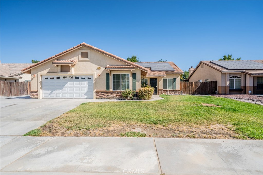 Beautifully maintained single-family home that combines elegance, comfort, and energy-efficient upgrades in a desirable Victorville neighborhood. Step inside and be greeted by an inviting open plan kitchen and living room, perfect for entertaining or enjoying relaxed family evenings. The kitchen is appointed with sleek granite countertops, offering both durability and style, and flows seamlessly into a formal dining room, ideal for celebrations and gatherings. A cozy fireplace anchors the living area, creating a warm ambiance throughout the home, while large windows fill the space with natural light. The master bedroom is a true retreat, featuring a generous walk-in closet and direct access to a full bath. Three additional bedrooms and two additional bathrooms offer flexibility for family, guests, or a growing home office. Modern conveniences abound, including a dedicated laundry room, a newly installed water heater, New central air conditioning, New Furnace to keep you comfortable year-round, and solar panels—helping to reduce utility costs and your carbon footprint. The attached garage and added driveway space provide ample parking and storage, adding to the home’s practical appeal. The curb appeal is enhanced by a well-maintained exterior. The backyard has a covered patio, storage shed and nicely landscaped to enjoy the backyard BBQ's with family and friends. Make this yours today!!