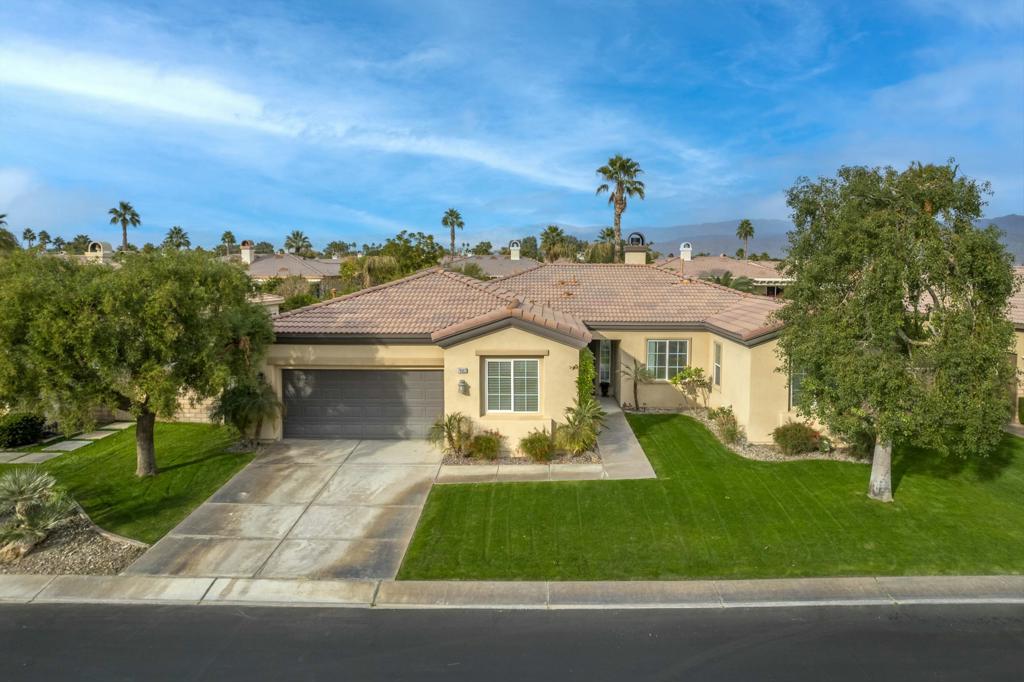 Pristine Clean Long Term Lease with Newer Carpet in Centrally Located Esplanade, La Quinta. This 3BR/3BA + Den/Office single family home features just over 2,000 square feet with granite kitchen and stainless steel appliances. Great bedroom separation, with the primary suite at one end, ensuite guest bedroom on the opposite end, and guest bedroom 3 at the front of the home. The convenient den/office located off the entry can also serve as a nursery or be set up with as a sleeping quarters. The spacious, grassy backyard is freshly overseeded and surrounded with mature landscaping and pops of color. Perfectly positioned for easy freeway access and close to schools, dining and shopping. Don't wait to secure this long term lease in the heart of La Quinta! Tenant pays for: water, gas, electric, cable and internet. Owner pays for: monthly HOA and landscaping service.