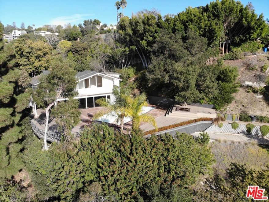 Amazing development opportunity on a 1.26 acre property in prime lower Bel-Air. Expansive 180 degree views of city, canyon, and Bel Air Country Club's famous back nine. Gated Entry with garden. If you are looking for a truly prestigious, private location with unbeatable views, this is your home!