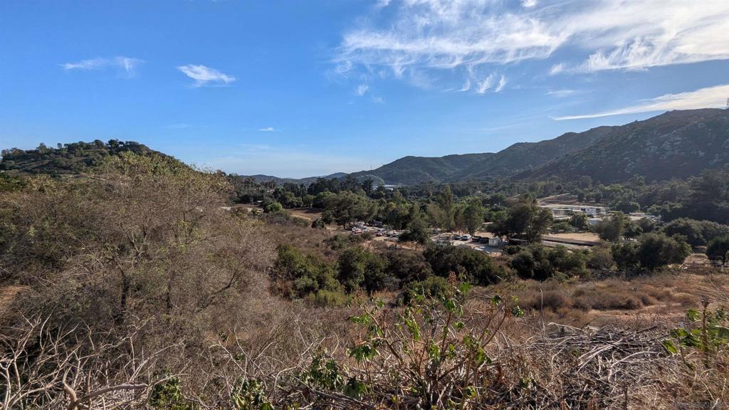 Discover over 5 acres of prime land in upcoming equestrian neighborhood of North Escondido, offering breathtaking views and serene privacy. Land is quiet, gated and partially fenced. This spacious property has a pad ready to for your build and is waiting for your vision to come to life. With a minimum lot size of 2 acres and electricity nearby, it's the perfect location to build your dream home or retreat. Split the lower part and sell it separately or build another house. Embrace the tranquility of rural living while still being close to city conveniences. This is a rare opportunity to own a slice of paradise and create the home you've always imagined!