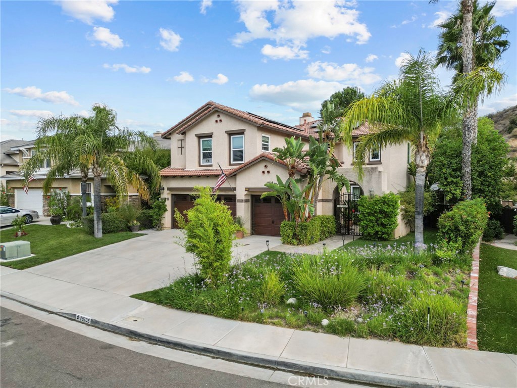 Welcome to your own slice of paradise, tucked away at the end of a peaceful cul-de-sac in one of Santa Clarita’s most desirable neighborhoods.
This impressive 3,000 sq ft home offers generous living space, a flexible layout, and a backyard designed for both relaxation and enjoyment. At the heart of the home is a beautiful kitchen featuring stainless steel appliances, granite counters, and plenty of counter space. The thoughtful floor plan includes a full bedroom and bathroom downstairs (currently used as an office), formal living and dining rooms, and a spacious family room. Upstairs, you'll find a large master suite with a separate retreat, a spacious master bath, a walk-in closet, and two guest rooms—both with direct access to a shared full bathroom. This home also features dual A/C units, solar with battery backup, and a 3-car garage. Step outside to your private backyard retreat featuring a luxurious spa, a covered patio, and lush mature landscaping that creates a private oasis—perfect for relaxing or hosting guests.