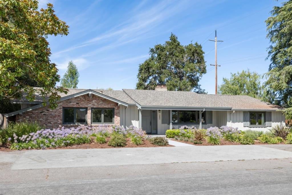 Nestled on a sought-after street in North Los Altos, 390 Cherry Avenue presents an exceptional opportunity for an updated home on an expansive 12,000+ square foot lot. This light-filled 1,800 square foot residence boasts an array of recent enhancements, including a new roof, copper plumbing, updated sewer line, HVAC + A/C, and double-pane windows, ensuring modern comfort and efficiency. Step inside to discover updated bathrooms and contemporary lighting, and be drawn to the spacious living room with its impressive vaulted wood-beam ceiling. The updated kitchen provides direct views of and access to the sprawling backyard, an idyllic setting for entertaining, gardening, or simply enjoying California's outdoor living. With its desirable east/west orientation, abundant natural light fills every room. The convenience of walking to downtown Los Altos and highly-rated schools Santa Rita Elementary, Egan Jr High, and Los Altos High makes this a perfect place to call home.