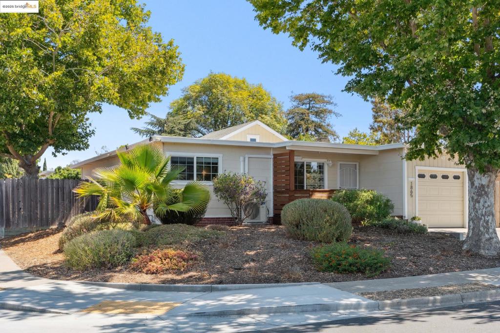Settle into this lovely 3 bed/2 bath California Rancher on a spacious corner lot offering garden on three sides. Already with a classic layout, the owners with their growing family further improved their home in 2024 with additions to both private and public spaces. First, a primary bathroom with a step-in shower was added for ensuite convenience and privacy. Then they added a large family room, complete with wet bar and space for media, play and more, facilitating the flow from living to dining to family to outdoors. The back yard contains both patio and lawn - lots of space for play, hanging out and entertaining. There's side yard space with tree shade as well through the sliding door off the middle bedroom, and a hills view from the front porch. Other features include hardwood and bamboo floors, dual-pane windows, a working fireplace, a newer hall bath and an updated kitchen with stainless appliances. The owners added air conditioning and improved the driveway to fit 2 cars side-by-side. With all of this and within 1.5 miles of 2 freeways and multiple parks, shopping areas and restaurants, what’s not to like??