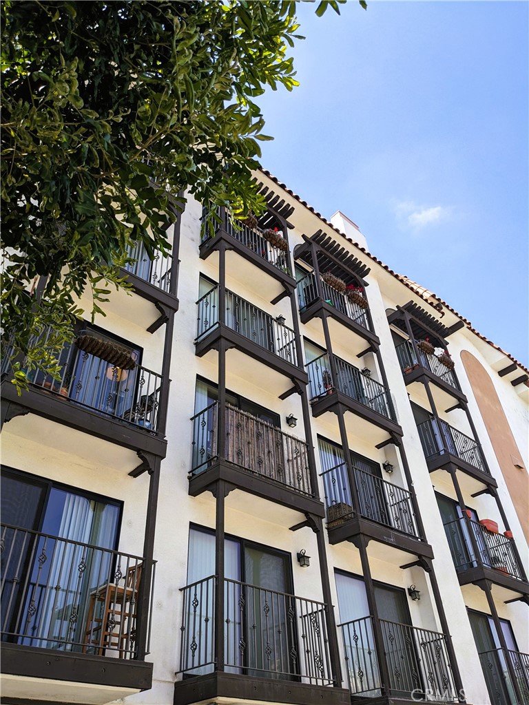Spacious and private 2 bedroom, 2 bath apartment on the second floor with two juliette balconies, granite countertops, attractive faux-redwood flooring, and a gas-powered fireplace. Two sliding glass doors in the living room open onto a sunny interior courtyard. A sliding glass door in the master bedroom features a view of the nearby Hollywood Hills. The master bedroom boasts a spacious dual-access walk-in closet. A two-vehicle tandem parking space is conveniently located directly beneath the unit, which sits at the quiet sunny rear of the building. Camarillo Sunshine Apartments is a gorgeous Spanish Colonial Revival apartment community nestled in charming West Toluca Lake. Built in 1985 and meticulously maintained under new management, Camarillo Sunshine Apartments is a five-minute walk from the hip and happening NOHO Arts District, and a stone's throw from Studio City, Laurel Canyon Boulevard, and the heart of Hollywood. Come discover the quality, value, and convenience of life at Camarillo Sunshine Apartments, West Toluca Lake's premier apartment complex. Book a tour of this updated, premium two-bedroom apartment before it's gone.
