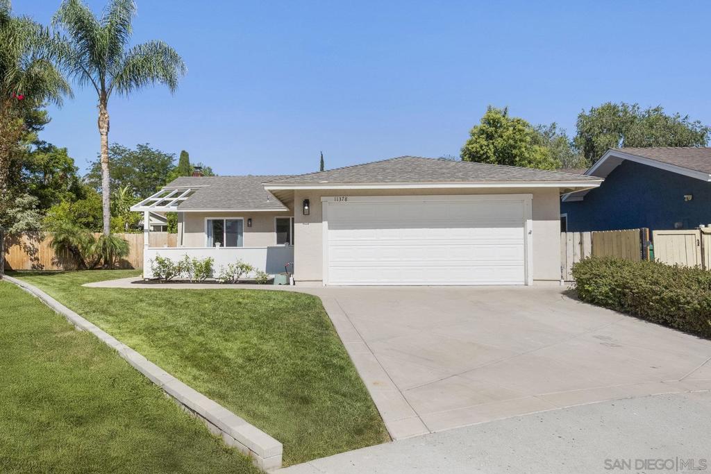 Welcome to this charming, move-in ready 4-bedroom, 2-bathroom single-story home tucked away on a peaceful, family-friendly cul-de-sac in the highly desirable Rancho Peñasquitos neighborhood. Situated on an oversized corner lot, this property offers the perfect blend of comfort, privacy, and outdoor space. Step inside to discover brand-new flooring throughout, tastefully remodeled bathrooms with modern finishes, and a kitchen featuring a new oven and microwave, sink, and resurfaced cabinets. The open and functional layout includes a flexible room off the family room that can serve as an office, playroom, or guest suite—ideal for a variety of lifestyle needs. The expansive, park-like backyard is a true highlight, featuring mature fruit trees—pomegranate, grapefruit, lime, lemon, and orange—lush green lawn, and a covered patio perfect for entertaining or relaxing outdoors. With ample space, it also offers the potential to add an ADU and a swimming pool, giving you the opportunity to create your dream outdoor oasis. Adding to its appeal, this home is located within the highly sought-after Poway Unified School District and is served by top-rated schools: Rolling Hills Elementary, Black Mountain Middle School, and Mt. Carmel High School. Conveniently close to parks, shopping, and freeway access, this home blends comfort, versatility, and an unbeatable location—ready to welcome its next owners.