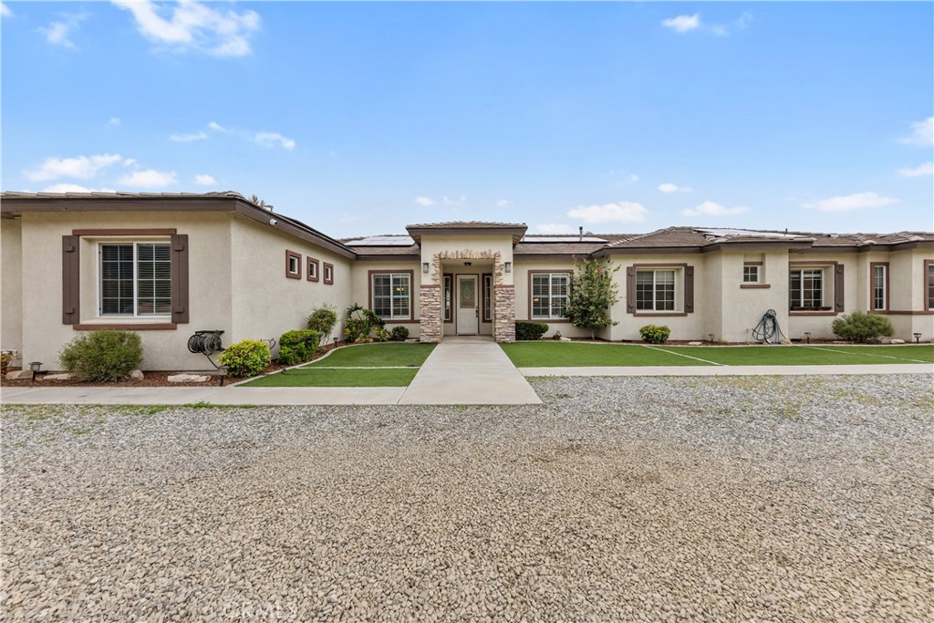 Got Toys? We've Got Room for All of Them! Nestled in the scenic Gavilan Hills, this incredible single-story pool home with a detached casita sits on 5 fully usable acres-perfect for storing RVs, boats, equipment, or all your favorite toys. With 7 bedrooms plus an office and 4 bathrooms, this spacious home offers over 4,570 square feet of comfortable living space. Its ideal for multi-generational living, hosting guests, or anyone who loves to entertain. The heart of the home is a large kitchen with tons of counter space, generous storage, and a bar top for additional seating. Just off the kitchen, you'll find a warm and welcoming family room, perfect for movie nights or hanging out with friends. Theres also a formal dining area and an oversized office, great for working from home or running a business. The primary suite overlooks the backyard and sparkling pool, offering a peaceful retreat with a spacious en-suite bath. Connected under the same roof but with its own entrance, the 960 sq. ft Casita includes a living area, kitchenette, bedroom, and bathroom-perfect for in-laws, guests, or rental potential. Additional highlights include a 3-car attached garage, a 2-car detached storage garage, paid-off solar system, and full property fencing. If you've been looking for space, freedom, and flexibility, this is the one. Don't wait-homes like this don't come around often!