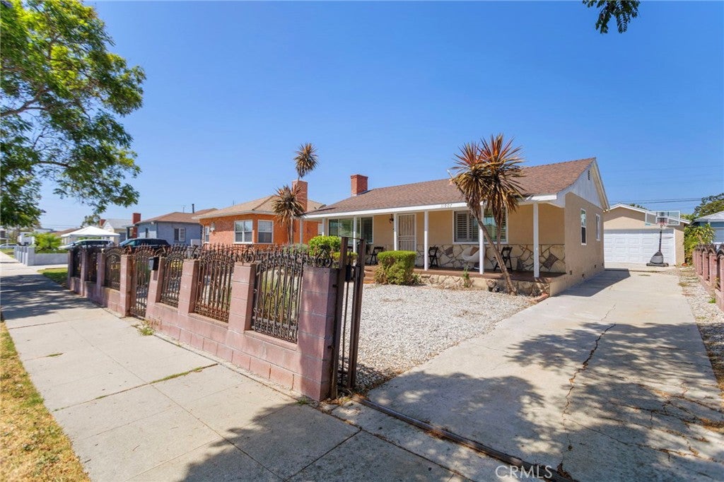 11907 Orchard Avenue, Los Angeles CA 90044