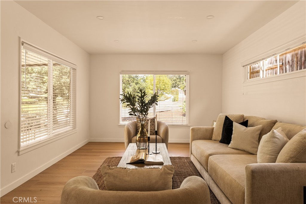 Nestled above Foothill Blvd in one of La Crescenta’s most desirable neighborhoods, this unique property offers incredible potential and versatility. The main house features a remodeled interior with one bathroom, and a separate dining room - ideal for everyday living or entertaining. A spacious rear patio, accessible through the second bedroom, provides the perfect outdoor setting for relaxing or hosting. Just beyond, you'll find a convenient shed for storage or a creative workspace, located off the enclosed patio. At the back of the property sits a detached one-bedroom, one-bath guest house complete with a kitchenette perfect for extended family or guests. A shaded driveway and carport offer ample off-street parking, with easy access to Foothill Blvd and the 210 Freeway, making commuting a breeze. Truly a rare opportunity to personalize or expand in a prime La Crescenta location - close to top-rated schools, parks, shopping, and local amenities.