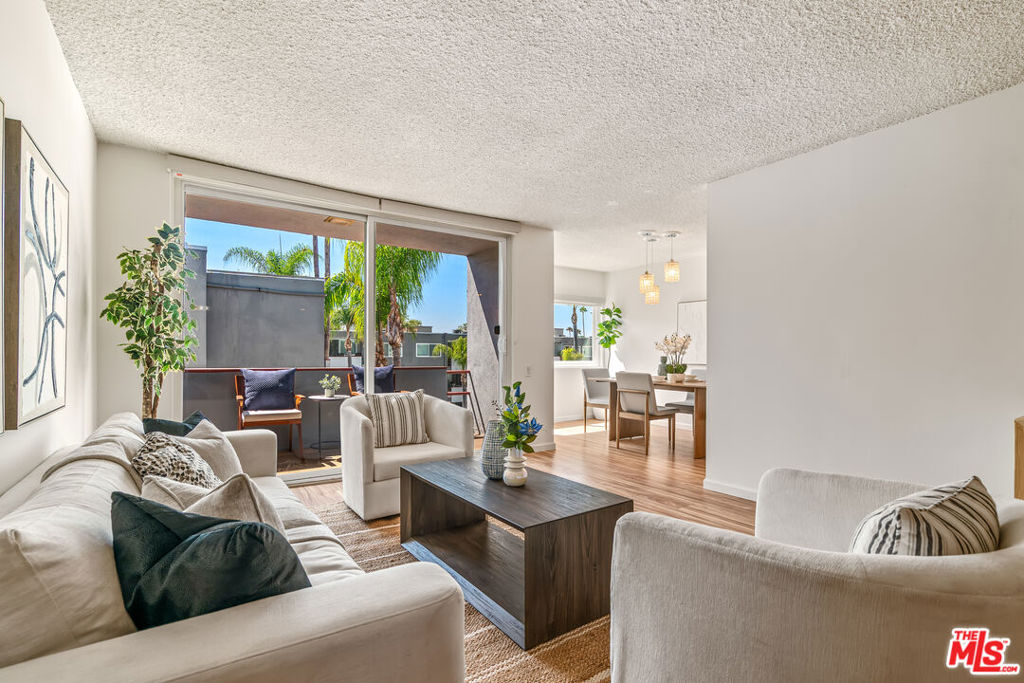 TOP FLOOR, large 2bd/2ba (1323 sq ft) END UNIT, brimming with natural LIGHT, in a great Sherman Oaks location, PRICED TO SELL! Renovated by the previous owner in 2021, this bright, open, spacious, single-level condo is the home you've been looking for. There's so much to love here: lovely light wood-toned laminate flooring, charming kitchen with quartz counters and mosaic tile, in-unit washer/dryer, central air, and room for all your stuff, with tons of storage space; primary bedroom has big walk-in closet plus another closet off the dressing area. AND: no one on top of you and only one attached wall. The building has a massive resort-style pool for your lounging and dipping pleasure, plus an in-ground spa -- it's like a staycation all year! There's also a gated garage and intercom entry for your safety and security, along with assigned tandem parking for 2 cars, plus ample guest parking as well as ample/easy street parking. And unlike so many condo buildings in the area jammed together on busy main thoroughfares, the Parkridge is on Tyrone - a quiet, lovely side street adjacent to a plethora of multi-million dollar single family homes. It's also a quick stroll or roll to the new Trader Joes at Citrus Commons and Bloomingdale's/Westfield Mall, and mere minutes to Gelsons, Ralphs, Whole Foods, and all the popular eateries and shops on Ventura Blvd. Quick jump to the 101 and 405, and convenient commute to Hollywood, West side and Valley studios. BONUS: beloved Sherman Oaks park is at your doorstep, with walking/running path, ball fields, basketball courts, Olympic-sized swimming pool, recreation center, etc. If you're looking for a tremendous value opportunity in an unbeatable locale, schedule a showing today.