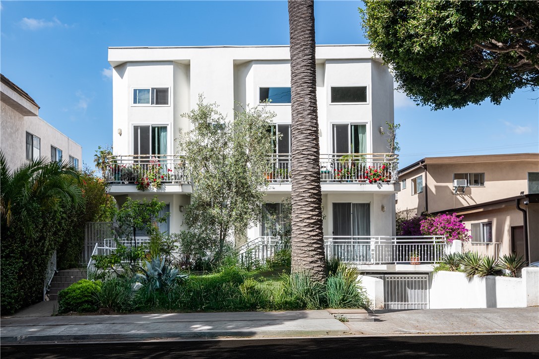 Stylish, Light-Filled Corner Condo in Prime Santa Monica!!! Welcome to this beautifully reimagined corner unit nestled in a quiet, gated 6-unit complex on one of Santa Monica’s charming tree-lined streets. Bathed in natural light, this thoughtfully updated home shares only one wall and offers a rare sense of privacy. The spacious living area opens seamlessly to two private balconies through dual sliding doors, creating an effortless indoor-outdoor flow—perfect for entertaining or unwinding in the ocean breeze. The updated kitchen connects smoothly to the living space and features refinished cabinetry, while the entire unit has been refreshed with new flooring, new roof, designer paint, recessed lighting, and modern finishes throughout. Enjoy the everyday convenience of in-unit laundry and a private, two-car garage located directly beneath the unit—a true luxury in this coveted neighborhood.
Ideally located just minutes from the beach, and surrounded by vibrant shops, restaurants, and cafes, this turnkey condo offers the best of Westside living. A rare find that blends comfort, convenience, and coastal charm.