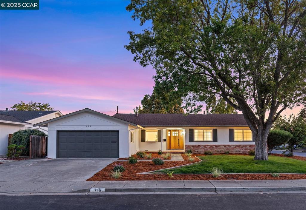 STUNNING Single Story home in Concord's desirable Ygnacio Woods neighborhood! This beauty features rich luxury vinyl plank floors, double pane windows, fresh paint, updated fixtures, and so much more! Marvel at the abundance of charm and natural light upon entering. Living room flows seamlessly with the Dining room and offers outside access. Kitchen boasts new stainless steel appliances, gorgeous quartz counter tops, white oak slim shaker cabinets, and a breakfast bar you're sure to enjoy! Family room features a cozy fireplace, perfect for those cooler months. Bathrooms have been tastefully remodeled with new vanities, mirrors, tiled floors and walls. Close proximity to trails, parks, shopping, restaurants, and more! This gem is truly a MUST-SEE and will go fast! Come take a look today!