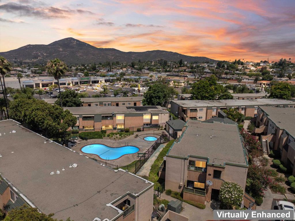 This charming 3BR/2BA ground-level condo offers over 1,200 sq ft of beautifully updated living space in the heart of San Carlos. Recently remodeled, it features a stylish kitchen with stainless steel appliances, gorgeous tile floors, custom paint, and floor-to-ceiling tiled bathrooms. The spacious primary suite includes two closets, while additional bedrooms and two private patios provide plenty of room for family, guests, or quiet retreats. Energy-efficient windows and in-unit laundry hookups add comfort and convenience. Step outside and you’re just steps from the pool and spa, with easy access to three community pools, spa, and playground. Location can’t be beat—just 1 minute to the 125, 3 minutes to the 8, and walking distance to two shopping centers with coffee shops, restaurants, banks, and grocery stores. Outdoor lovers will appreciate being close to Mission Trails, Cowles Mountain, and Lake Murray. Extra bonus: this home comes with an assumable loan at a below-market interest rate—potentially saving you hundreds per month! A rare find for qualified VA Home Buyers!