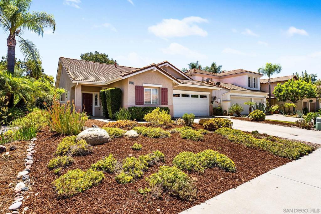 Discover this charming single-story home tucked away on a quiet cul-de-sac in the gated Rancho San Pasqual community, offering beautiful views of the surrounding hills and golf course. The open-concept floor plan features vaulted ceilings, durable flooring throughout, and 3 bedrooms plus an optional 4th—perfect for a home office or guest room. Freshly painted inside and out! Central A/C, all new ceiling fans & light fixtures, The kitchen is equipped with stainless steel appliances, an island with breakfast counter seating, and opens seamlessly to the family room, where a cozy stacked-stone fireplace creates a warm gathering space. The spacious primary suite offers comfort and privacy, while the low-maintenance landscaping and large patio cover make outdoor living easy year-round. An oversized garage provides 2 parking spaces plus a 12x7 workshop/storage area for hobbies or extra storage. Located on the newly renovated Dos Osos Golf Course, residents enjoy secure community amenities including a golf course, sparkling pool, spa, and clubhouse.