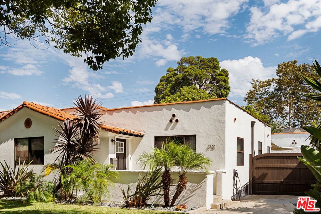 Beautifully updated Spanish-style 3BR/2BA home for lease in the heart of Palms! This charming residence features an upgraded kitchen with modern finishes, including a built-in commercial espresso maker, along with remodeled bathrooms and abundant natural light throughout. The converted garage is now a fully renovated studio with its own full bath perfect for a home office or creative space. Enjoy a private backyard with a jacuzzi and plenty of room to relax, play, or entertain. Driveway parking is included. Ideally located in a prime Palms neighborhood, just moments from Culver City's shops, restaurants, and nightlife, with easy access to freeways and public transit. A perfect blend of classic charm and modern upgrades don't miss this versatile and stylish rental!
