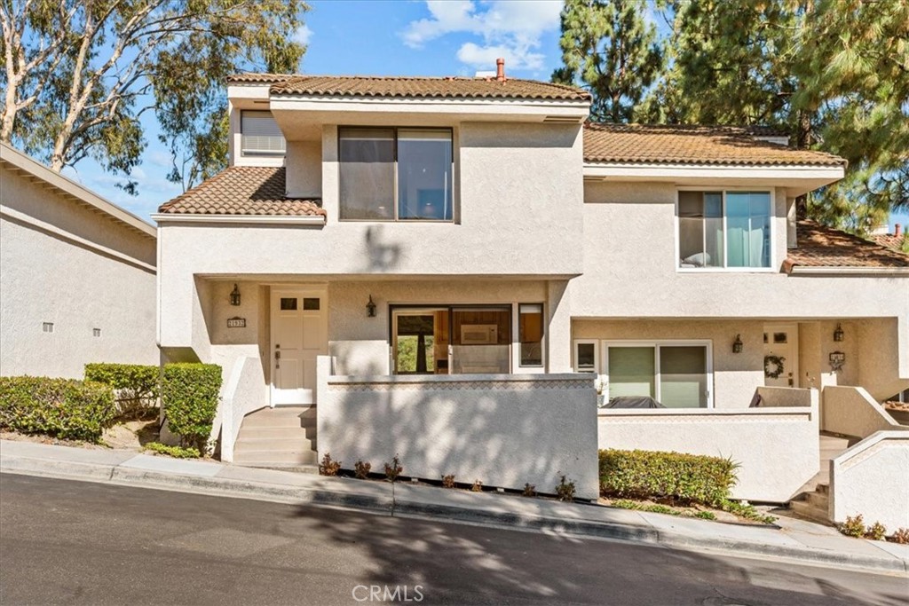 Enjoy panoramic views of the mountains and city lights from this beautifully newly painted 3-bedroom end unit on a quiet, single-loaded street. Located in the tranquil El Mirador community, just minutes from major shopping centers, and includes Lake Mission Viejo membership—offering boating, swimming, fishing, summer concerts, picnic areas, a clubhouse, and boat rentals.
The home features laminate flooring throughout, new toilets, new vanities and faucets, and a private deck with unobstructed views of the hills, mountains, and twinkling city lights. Resort-style living at its finest!