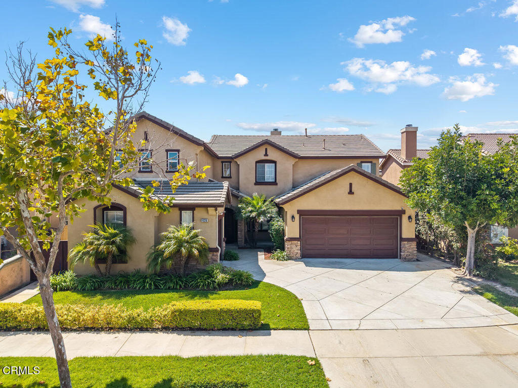 Welcome to 420 Ocotlan Way, an elegant residence offering nearly 2,900 square feet of living space in the heart of Oxnard. This spacious home showcases 4 bedrooms plus a versatile den/office, 3 bathrooms, and a 3-car garage, designed with both sophistication and functionality in mind.The open-concept kitchen is the centerpiece of the home, featuring a generous center island that seamlessly blends style and practicality--perfect for culinary creations and entertaining guests. The backyard is beautifully finished with turf grass, providing a low-maintenance retreat ideal for outdoor gatherings.Modern upgrades elevate the lifestyle of this property, including a Tesla car charger, energy-efficient solar panels, and central air conditioning for year-round comfort.Perfectly situated near schools, parks, shopping, and just minutes from Oxnard's stunning beaches, this home combines luxury, convenience, and modern living in one exceptional package.