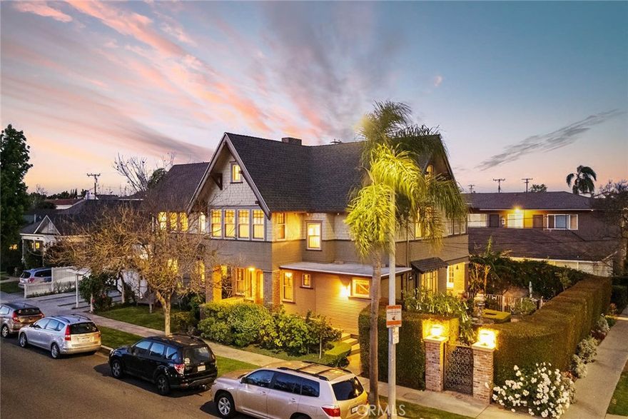 Behold a living canvas of architectural artistry: Pleasant View Manor, c. 1901, stands as an edifice where history, craftsmanship, and grandeur converge. At approximately 4,104 ft² (3,173 ft² main + third-floor attic and wine-cellar basement), it unfolds across 18 commanding rooms, including 6 bedrooms, 5 bathrooms, three master suites, two full kitchens, a grand living room adjoined by an elegant parlor/family room, and a dining room crowned with its original built-in buffet. Rich with light and history, the house boasts 78 windows framed by 48 doors — each a portal to another story. Now enhanced with a fully functioning in-law suite, complete with its own kitchen, generously sized bedroom, walk-in closet, bath, and private entrance.



Originally conceived by developer Charles E. Espey and his wife Olive L. Benton, this home was later transformed in c. 1918 by prominent architect Harvey H. Lochridge, nearly doubling its footprint—each wall, beam, and truss testament to eras layered in time. In 2004, its present owners undertook a three year long complete restoration—new electrical systems, copper plumbing throughout, upgraded HVAC for each level, seismic retrofitting, EV-ready garage—so that history and modernity dance in perfect harmony.



Designated both a City of Long Beach & County of Los Angeles Historic Landmark, Pleasant View Manor participates in the LA County Mills Act Program—an annual property tax savings (approx 50% reduction) that rewards stewardship of heritage. Yet this isn’t merely a relic—it is alive, poised just a gentle stroll from the beach, boutiques, cafés, 4th Street Retro Row, and The Art Theatre. Located in Historic Bluff Heights, it’s where Pacific breezes meet small-town charm, and where Los Angeles and Orange County live in conversation. Pleasant View Manor is not just a home—it is a curated experience, an enduring work of architectural art. A chance to own more than square footage: to own a story.