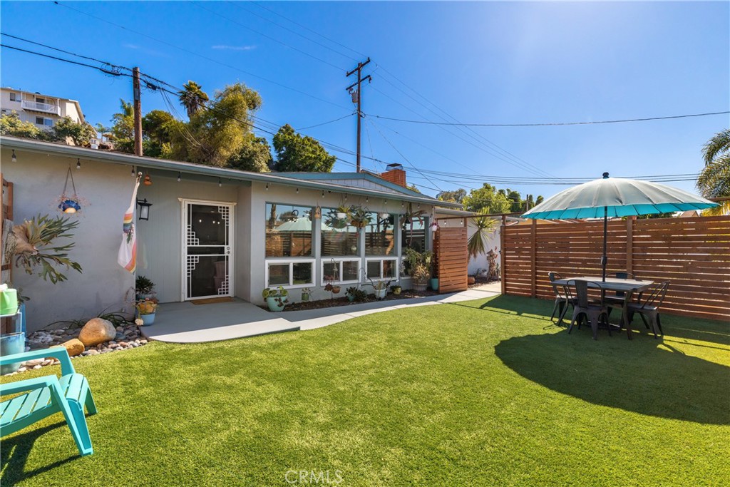 *Charming Single-Story Home with RV Parking on a Private Hillside Lot* Welcome to this vibrant 3-bedroom, 2-bathroom single-level gem nestled on over 1/4 acre in a peaceful, private hillside setting in Vista—right on the border of San Marcos. Located on a secluded private road, this home offers approximately 1,377 sq. ft. of comfortable living space and features RV parking, a fully fenced yard, and low-maintenance artificial turf—perfect for easy living and entertaining. Step inside to an inviting open-concept layout filled with natural light from stunning bay windows in the living room. You'll love the cozy fireplace, wood laminate flooring, and ceiling fans throughout. The colorful kitchen brings a playful vibe to the space, featuring stone tile flooring and an ideal setup for hosting friends and family. Down the hallway, you’ll find three spacious bedrooms, with the primary bedroom offering it's own private bathroom that features a stand in, dual-head shower. The hallway bathroom includes a convenient shower/tub combo for added flexibility. This home also features a solar lease for added energy savings, at only $130/month.
Location is everything, and this home delivers! You’re just minutes from the 78 freeway with quick access to North County Square shopping (Trader Joe’s, Target, Aldi, Walmart) and only a few exits from Cal State San Marcos. Head west and enjoy a quick drive to North County’s beautiful beaches!